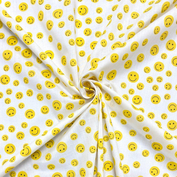 Yellow and White Smiley Face Polycotton Fabric Pound Fabrics