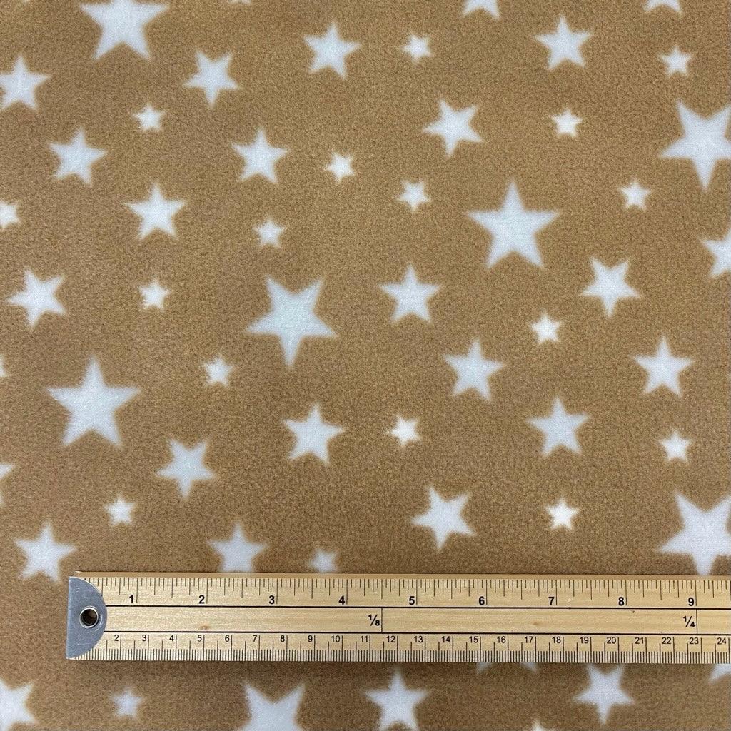 White Stars on Beige Anti Pill Polar Fleece Fabric - Pound Fabrics