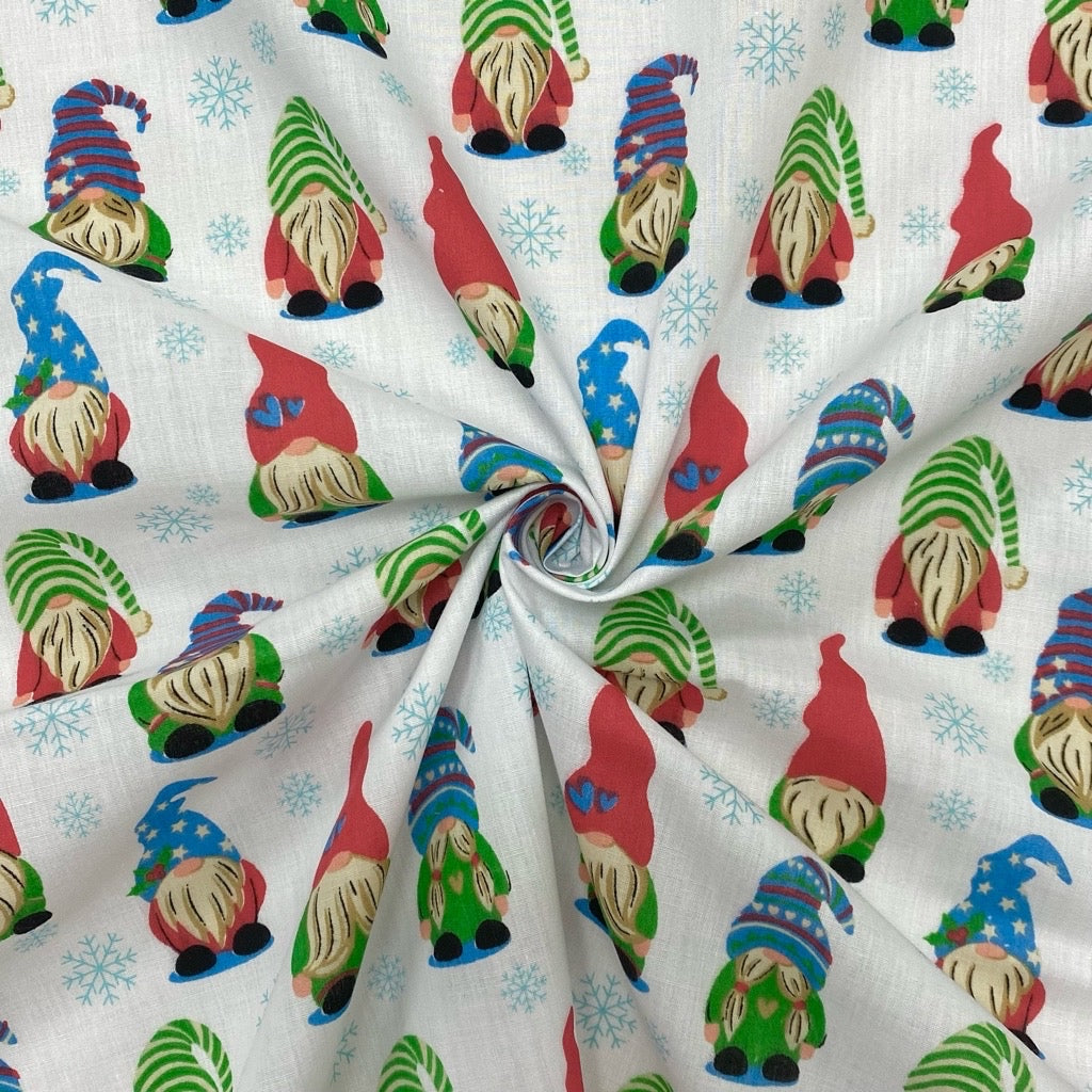 Snowflakes and Gnomes on White Polycotton Fabric