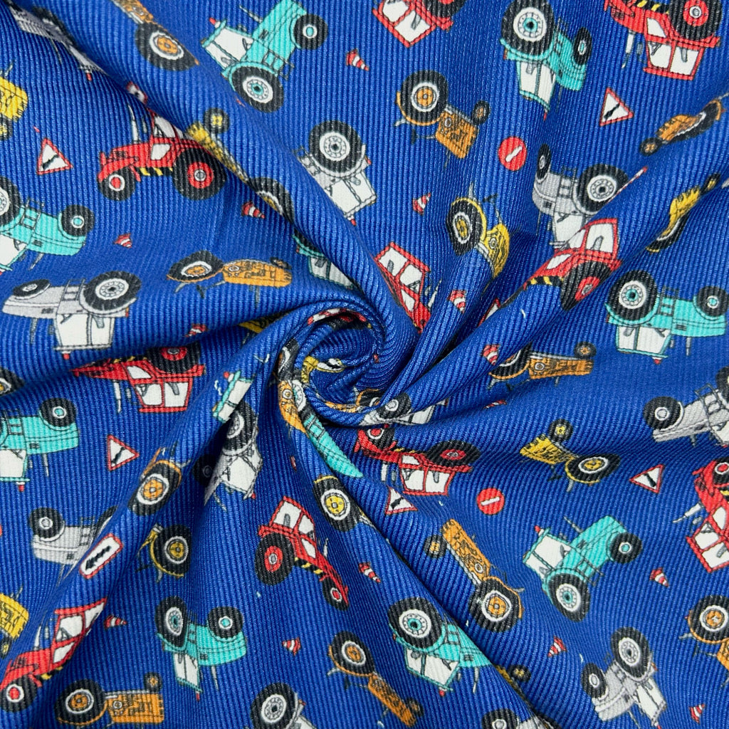 Mini Tractors on Blue Needlecord Fabric