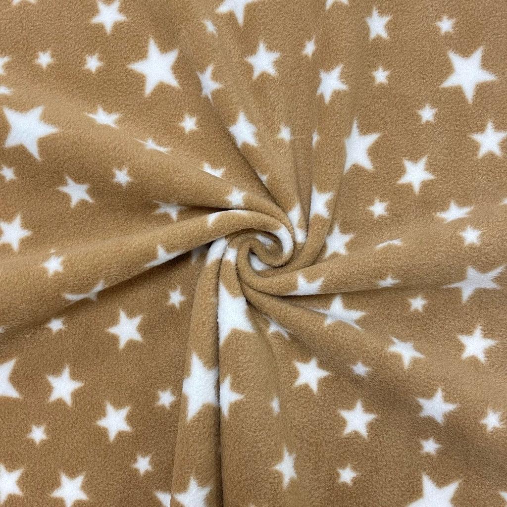White Stars on Beige Anti Pill Polar Fleece Fabric - Pound Fabrics