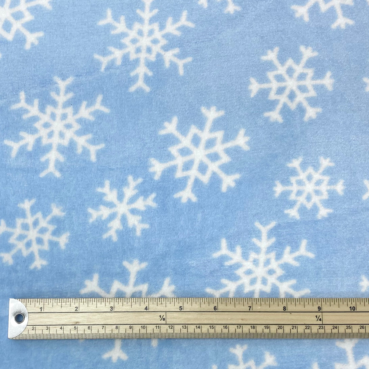 Snowflakes on Blue Cuddle Fleece Fabric