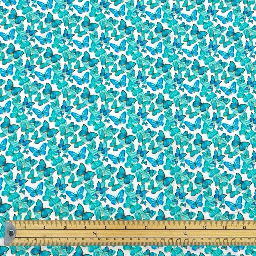 Blue and Teal Butterflies Bamboo Jersey Fabric - Pound Fabrics