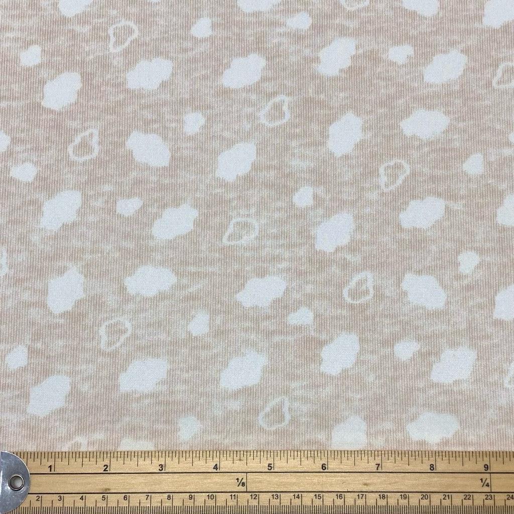 Clouds on Light Peach Fleece-Backed Jersey - 1m Pre-cut - Pound Fabrics