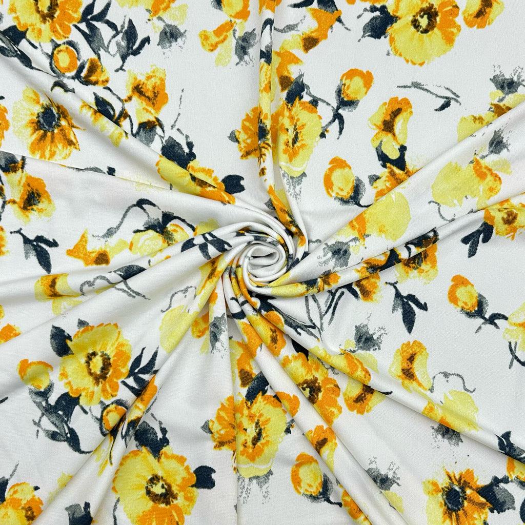 Yellow Flowers on White Jersey Fabric - Pound Fabrics