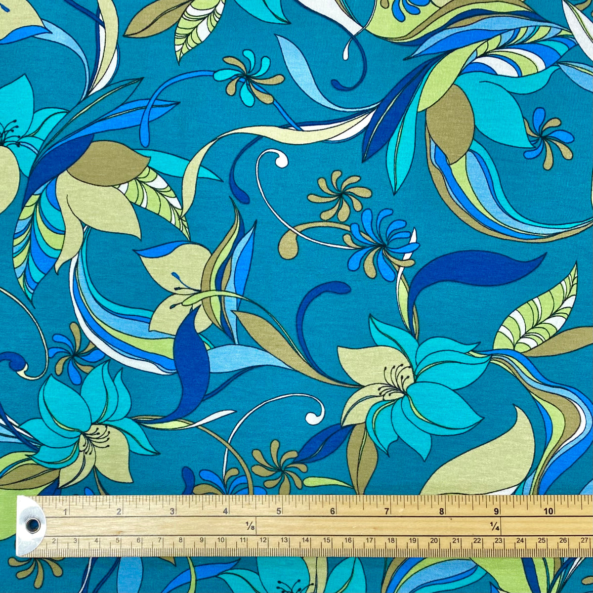 Animated Floral on Teal Viscose Jersey Fabric