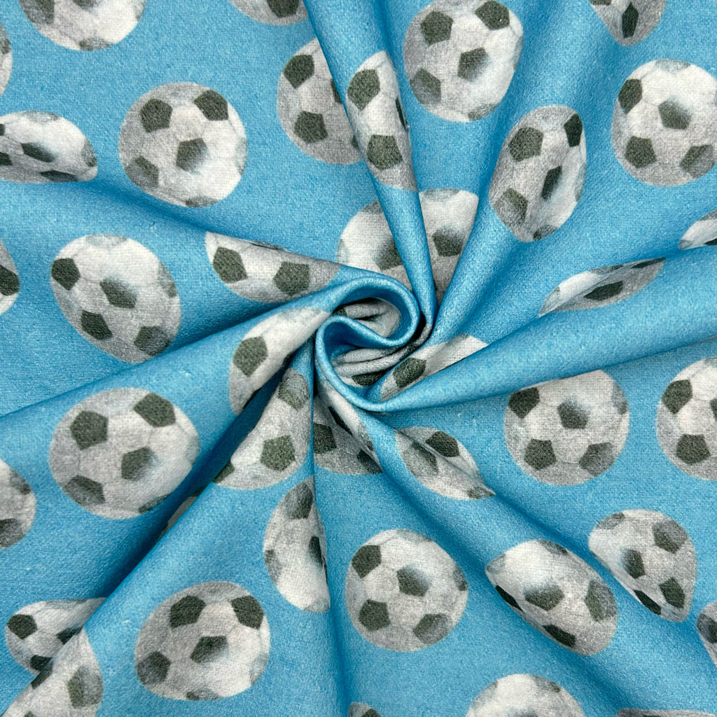 Footballs on Blue Brushed Cotton Fabric - Little Johnny