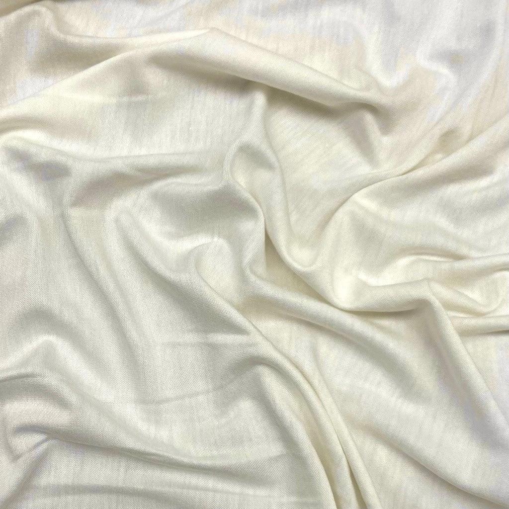 Mixed Shades Ivory/White Stretch Knit Fabric - 3 metres for £3 - Pound Fabrics