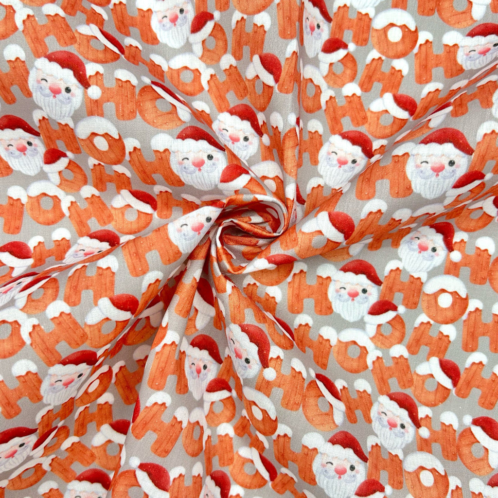 Santa Faces Polycotton Fabric