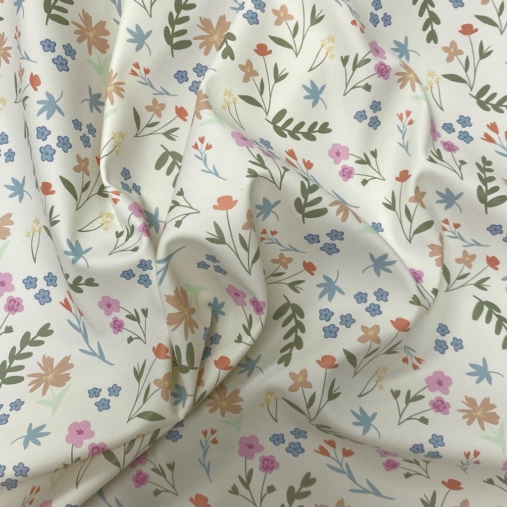 Petite Flowers on Ivory Raincoat Fabric