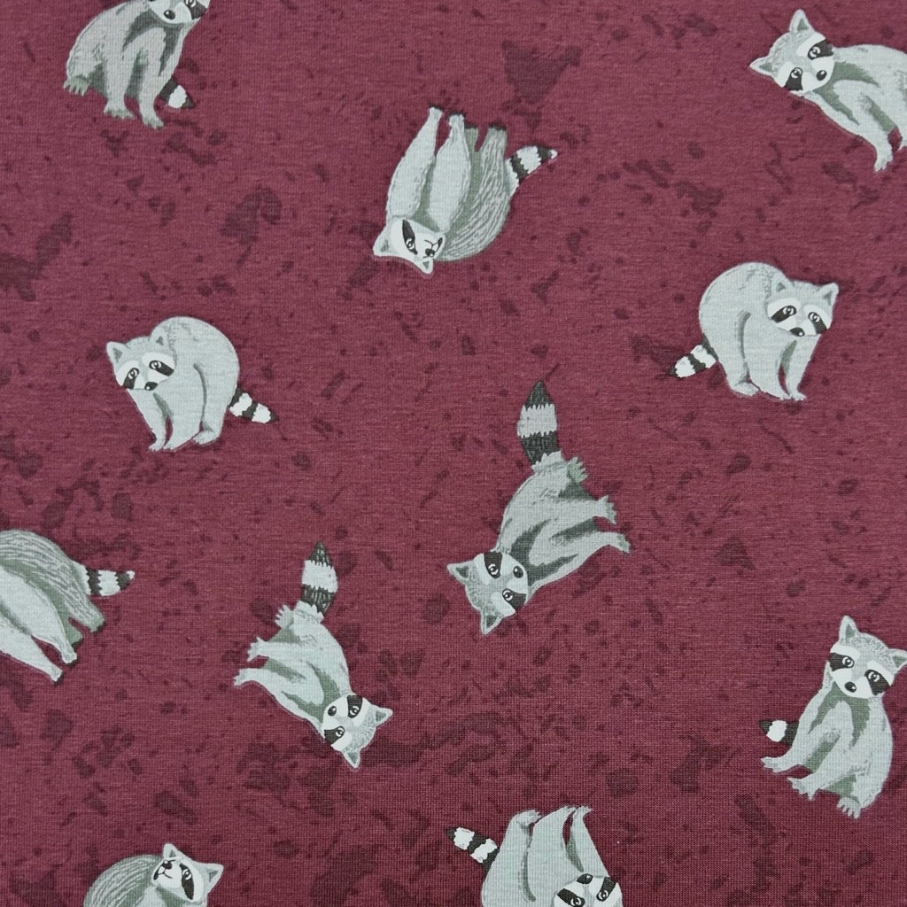 Raccoons on Burgundy Cotton Jersey Fabric