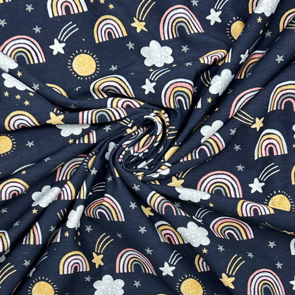 Rainbows on Navy 100% Cotton Jersey Fabric