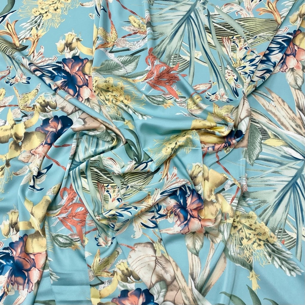 Abstract Floral Garden on Light Blue Satin Fabric