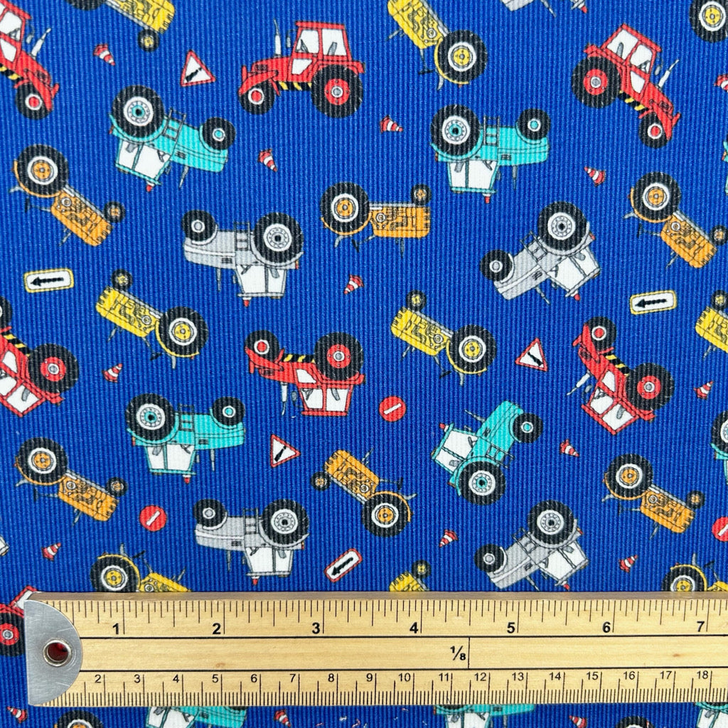 Mini Tractors on Blue Needlecord Fabric