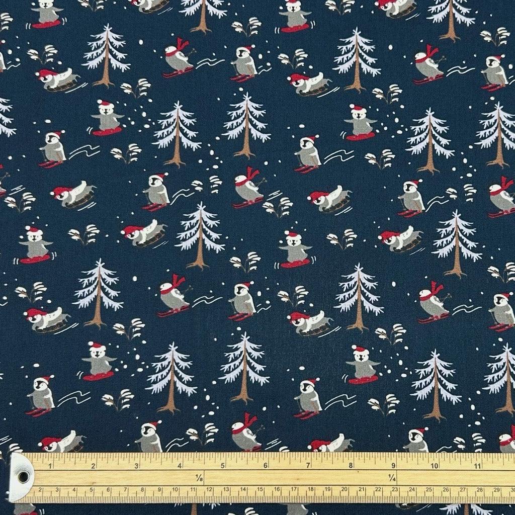 Skiing Christmas Penguins Cotton Poplin Fabric - Pound Fabrics