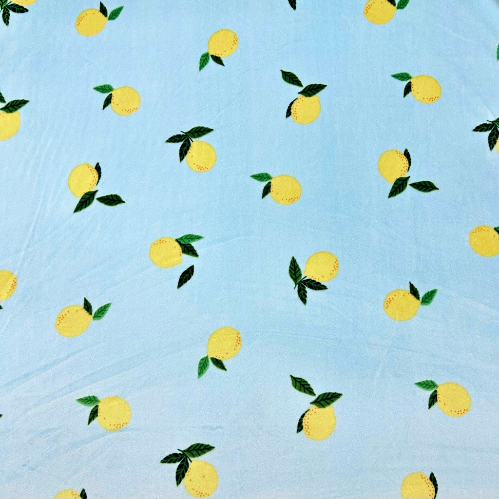 Lemons on Blue Fleece Jersey Fabric