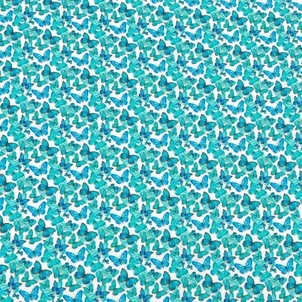 Blue and Teal Butterflies Bamboo Jersey Fabric - Pound Fabrics