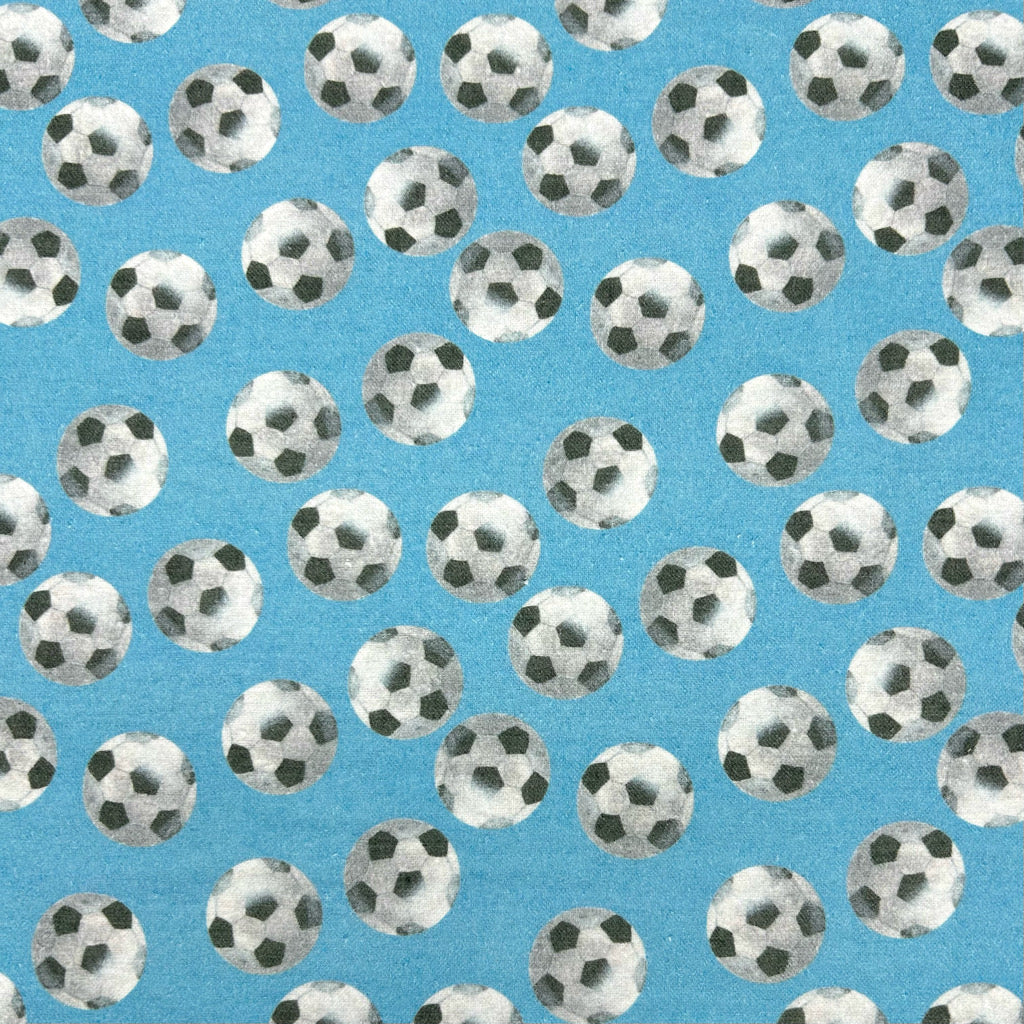 Footballs on Blue Brushed Cotton Fabric - Little Johnny