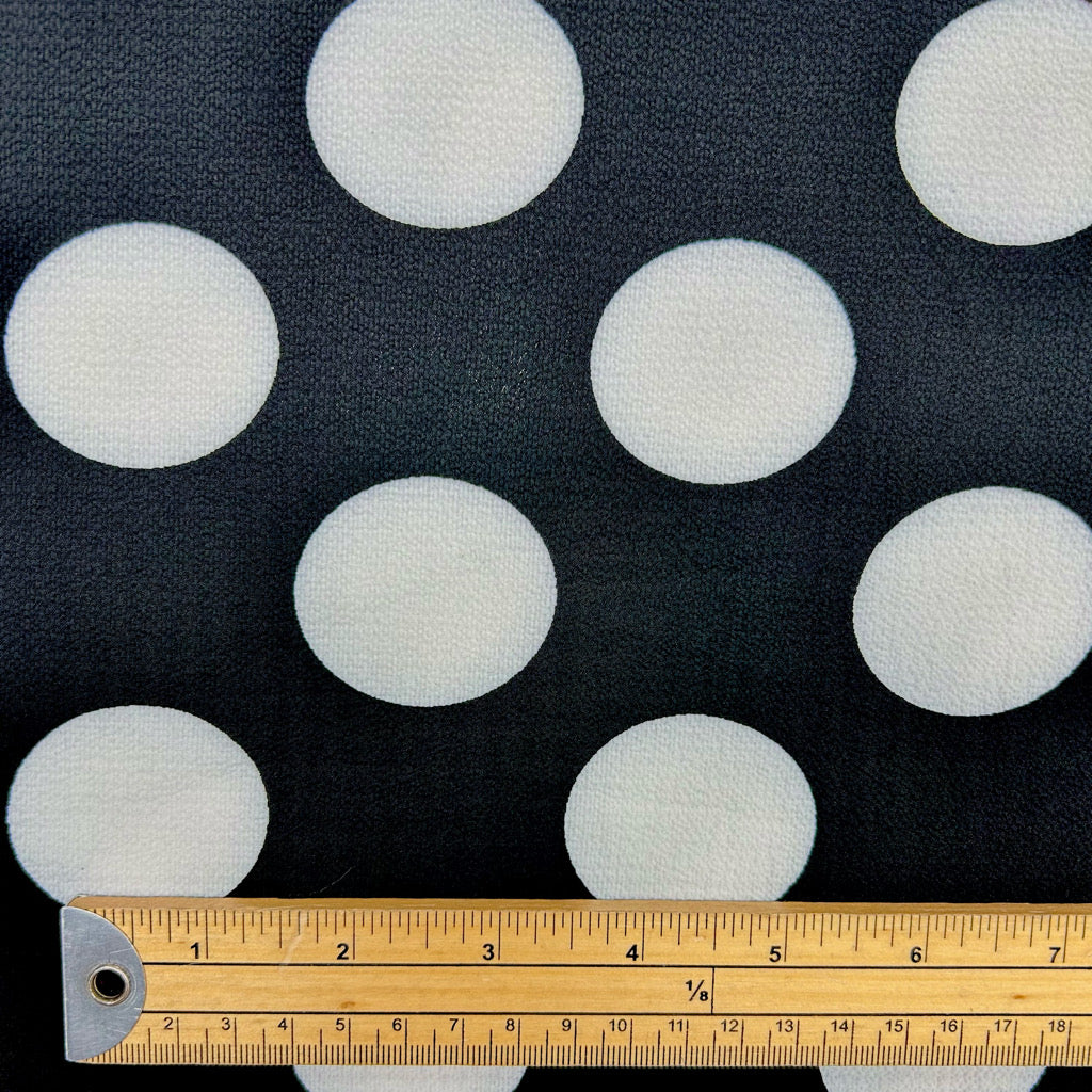 White Spots on Black Polyester Crepe Fabric