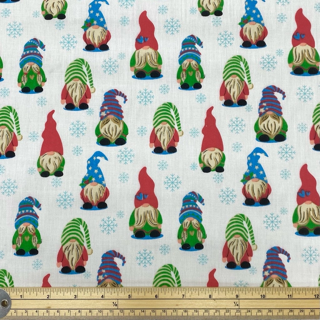 Snowflakes and Gnomes on White Polycotton Fabric