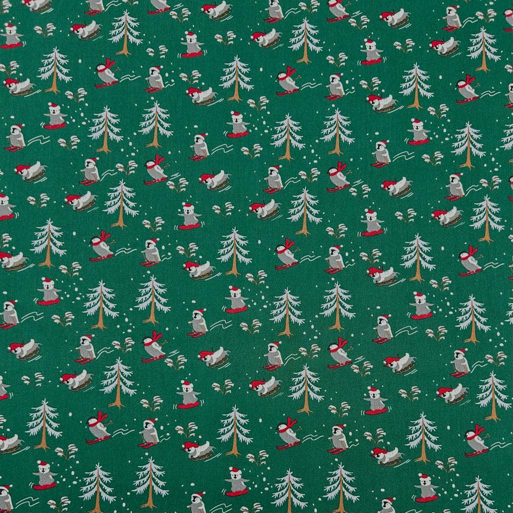 Skiing Christmas Penguins Cotton Poplin Fabric - Pound Fabrics