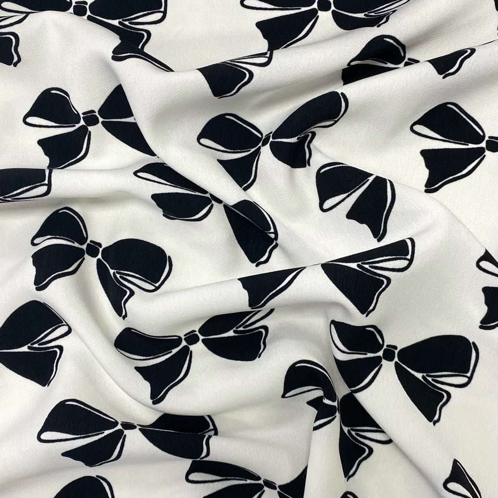 All Over Bows Polyester Fabric