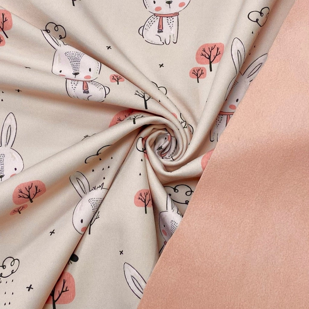 Bunnies on Baby Pink Softshell Fabric
