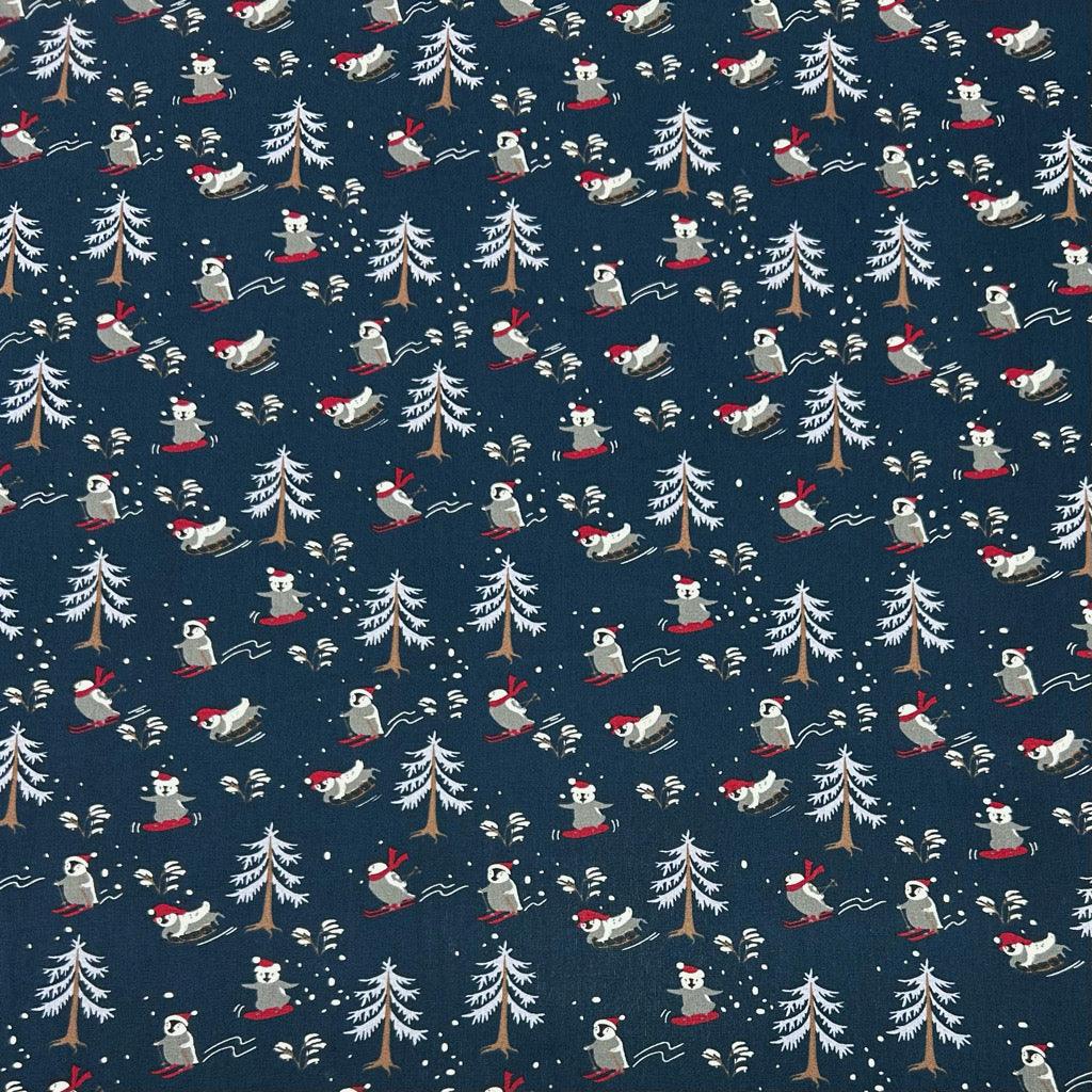 Skiing Christmas Penguins Cotton Poplin Fabric - Pound Fabrics