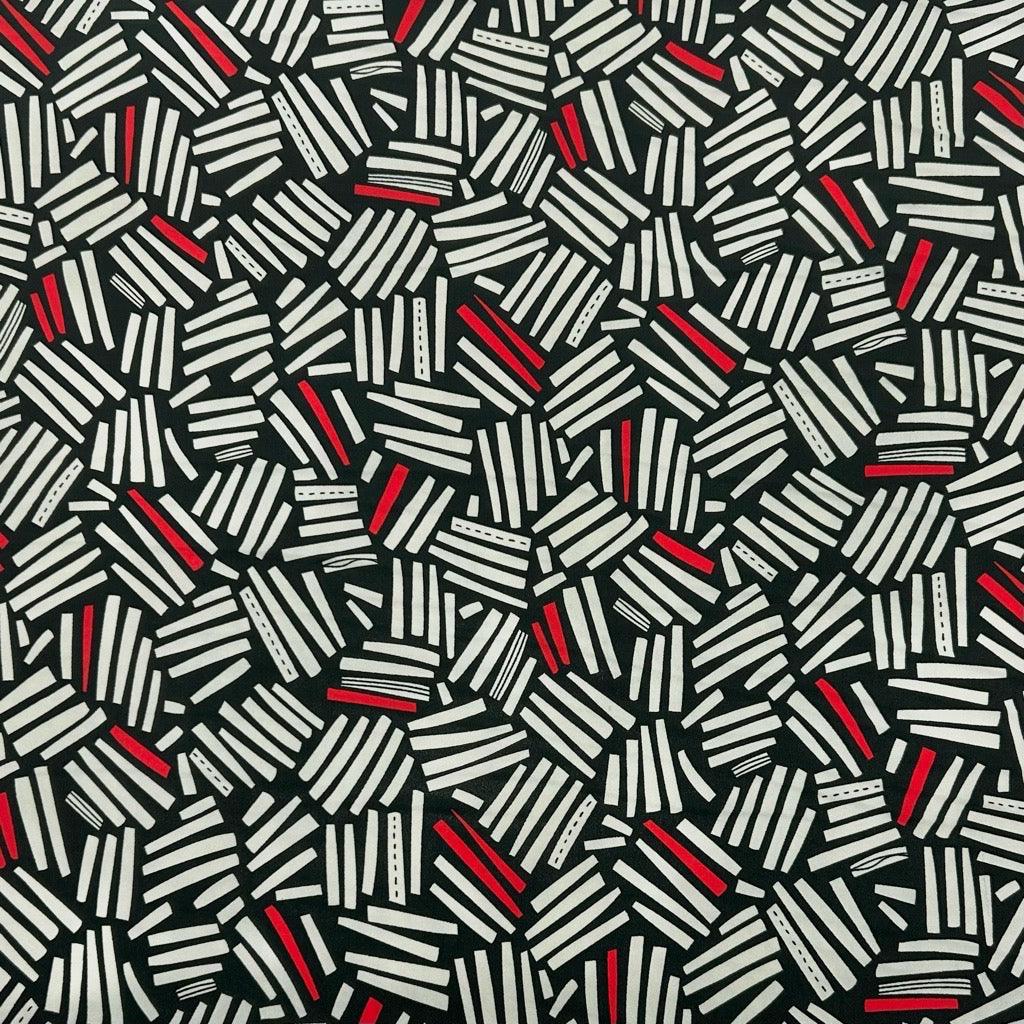 Cream and Red Lines on Black Crepe Fabric - Pound Fabrics