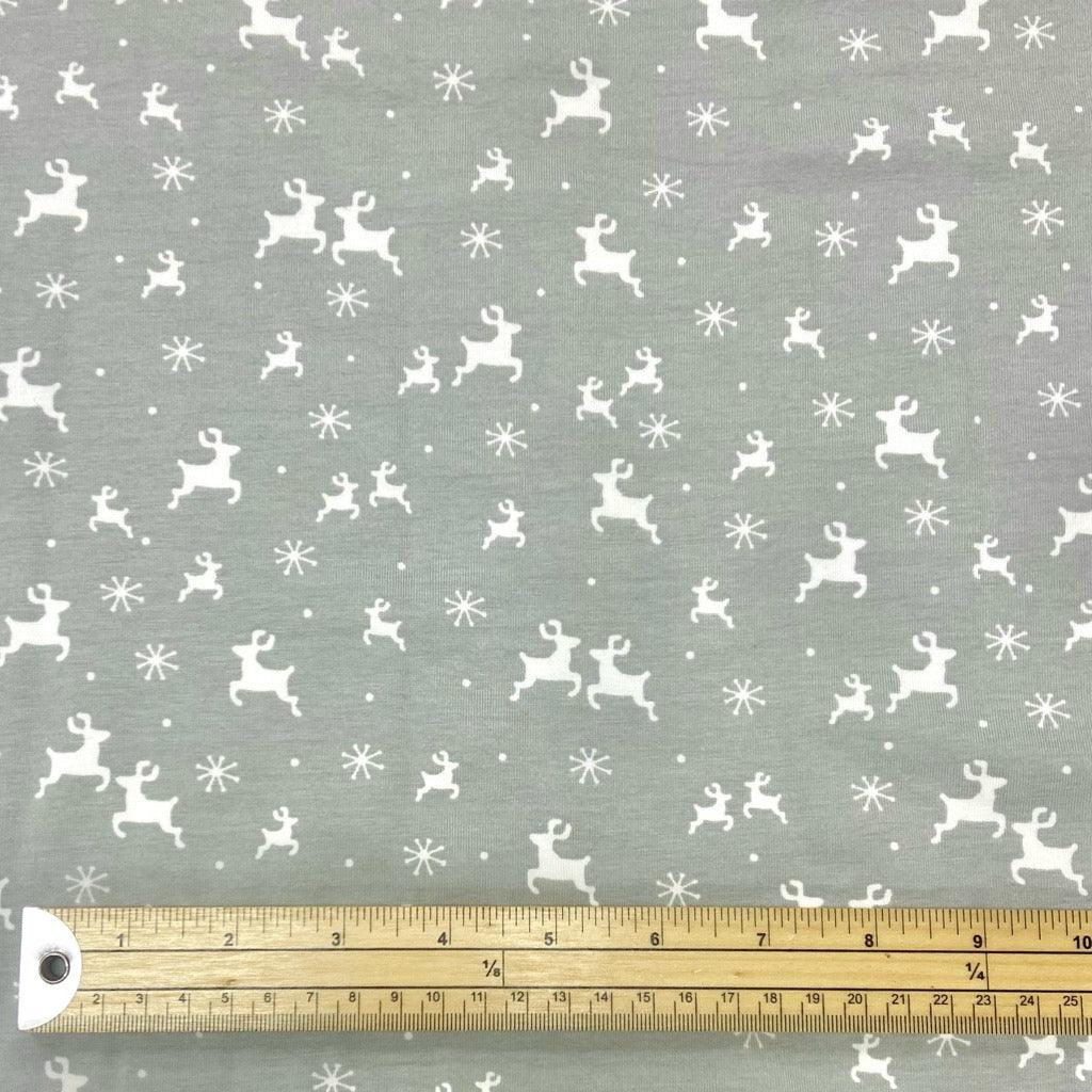 Reindeers on Grey Cotton Jersey Fabric - Pound Fabrics