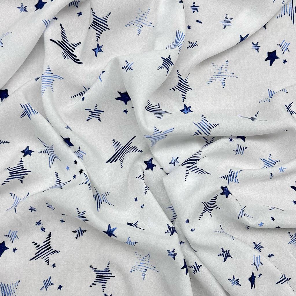 Blue Stars on White Viscose Challis Fabric - Pound Fabrics