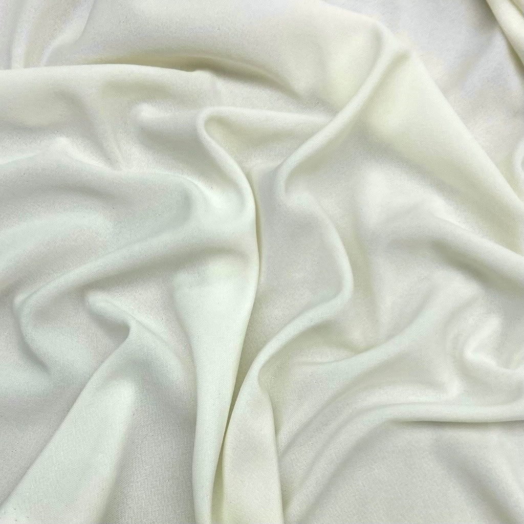 Mixed Shades Ivory/White Stretch Knit Fabric - 3 metres for £3
