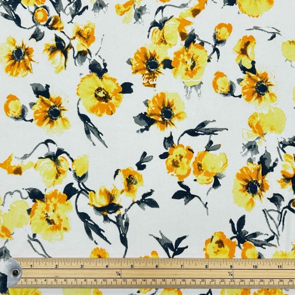 Yellow Flowers on White Jersey Fabric - Pound Fabrics