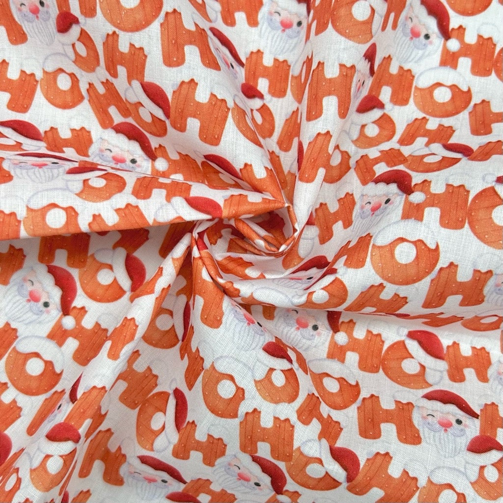 Santa Faces Polycotton Fabric