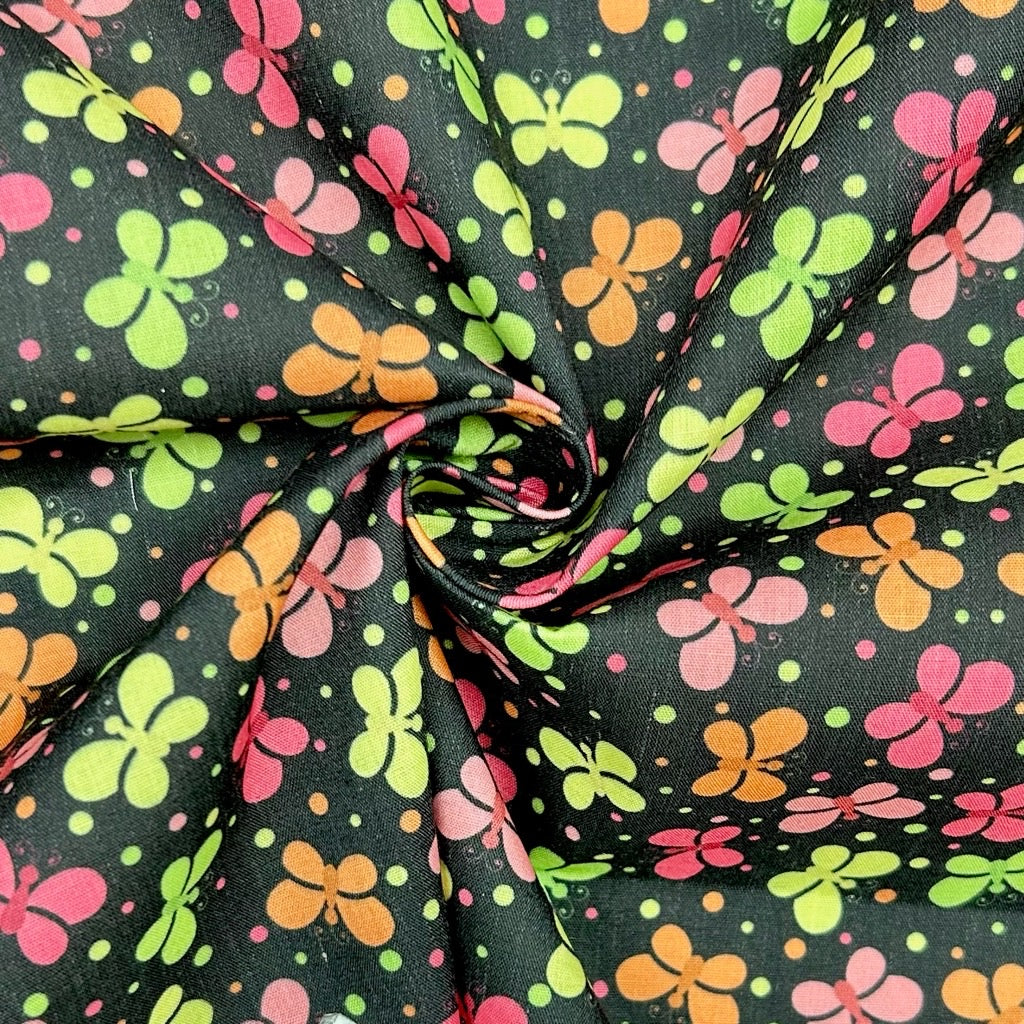Butterfly Burst on Black Polycotton Fabric