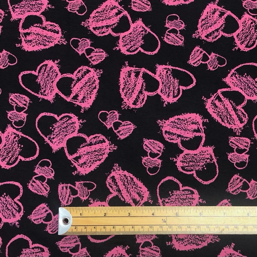 Pink Hearts on Black Knit Fabric - Pound Fabrics