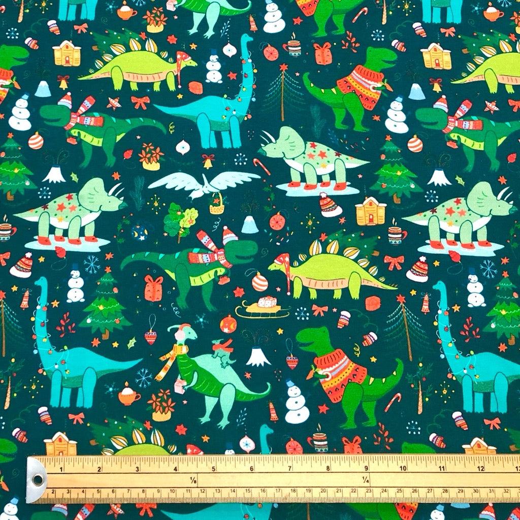 Christmas Dinosaurs on Dark Teal French Terry Fabric - Pound Fabrics