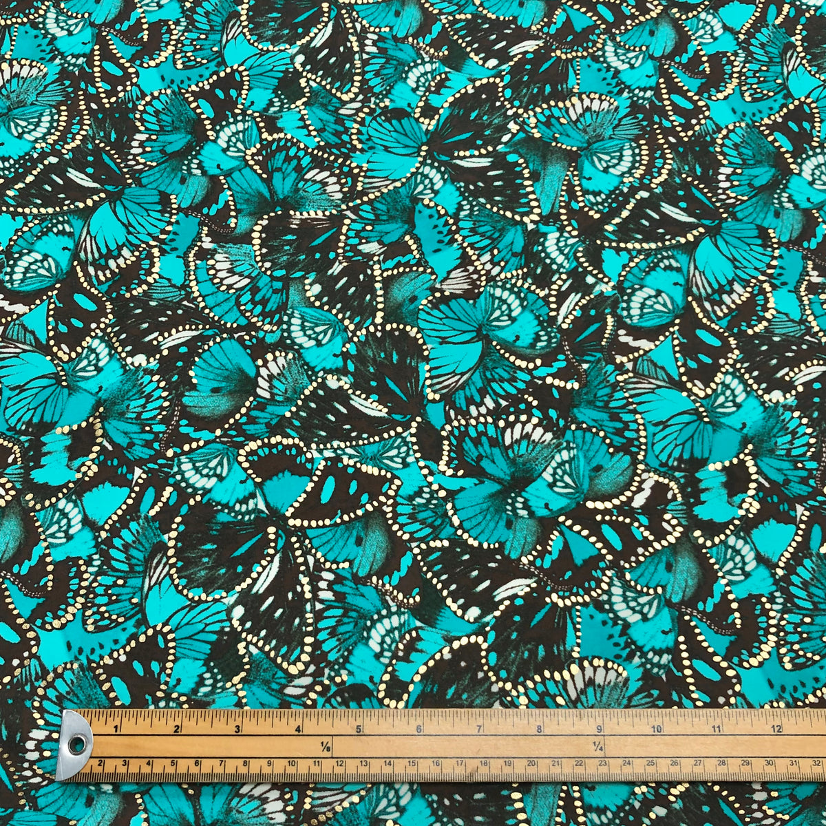 Foil Turquoise and Brown Butterflies Lycra Spandex Fabric - Pound Fabrics
