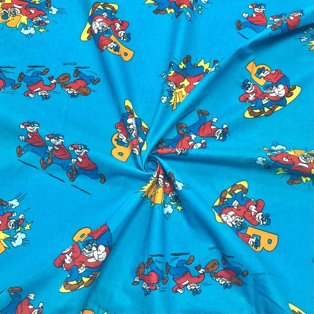 Beagle Boys on Blue Cotton Fabric - Pound Fabrics