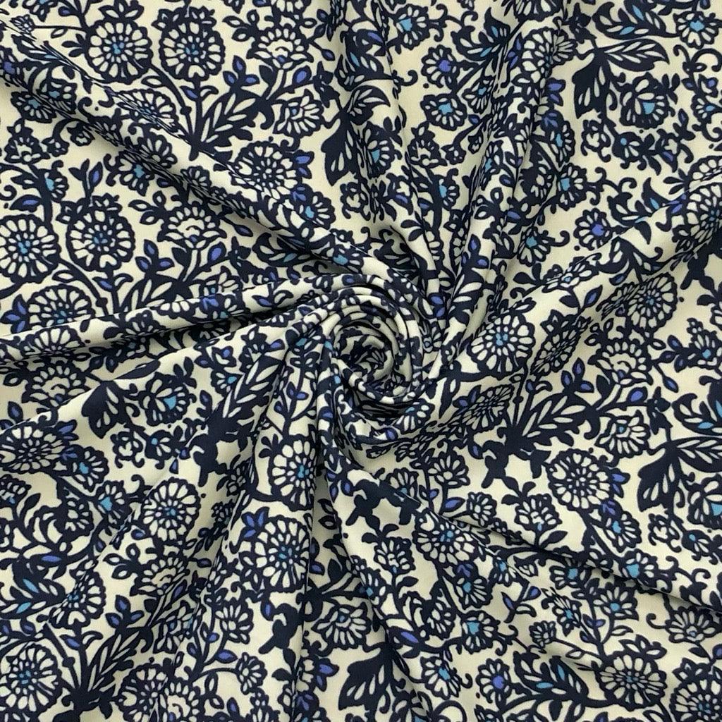 Navy Floral Patterns on Cream Lycra Spandex Fabric - Pound Fabrics