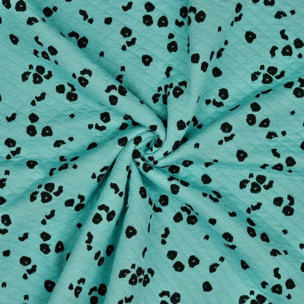 Animal Skin on Turquoise Quilted Jersey Fabric - Pound Fabrics