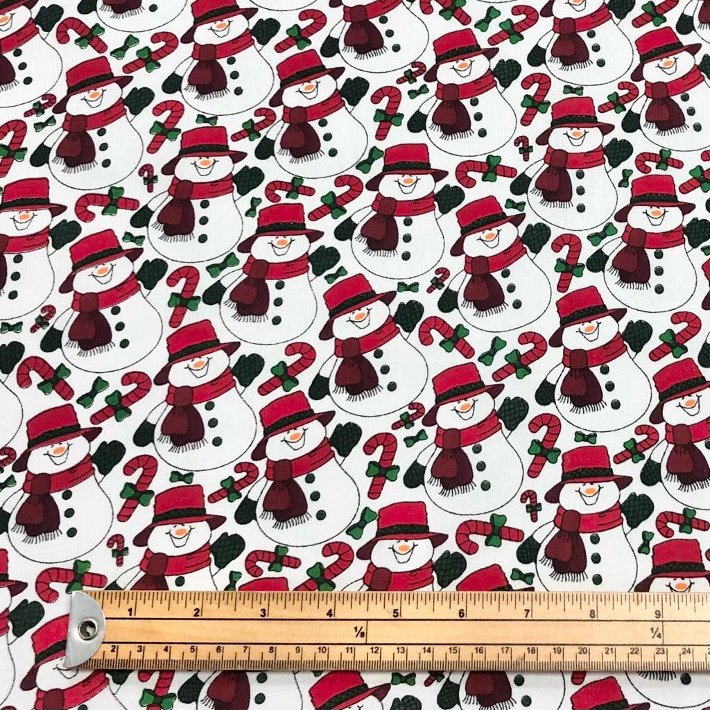 All Over Snowmen on White Polycotton Fabric - Pound Fabrics