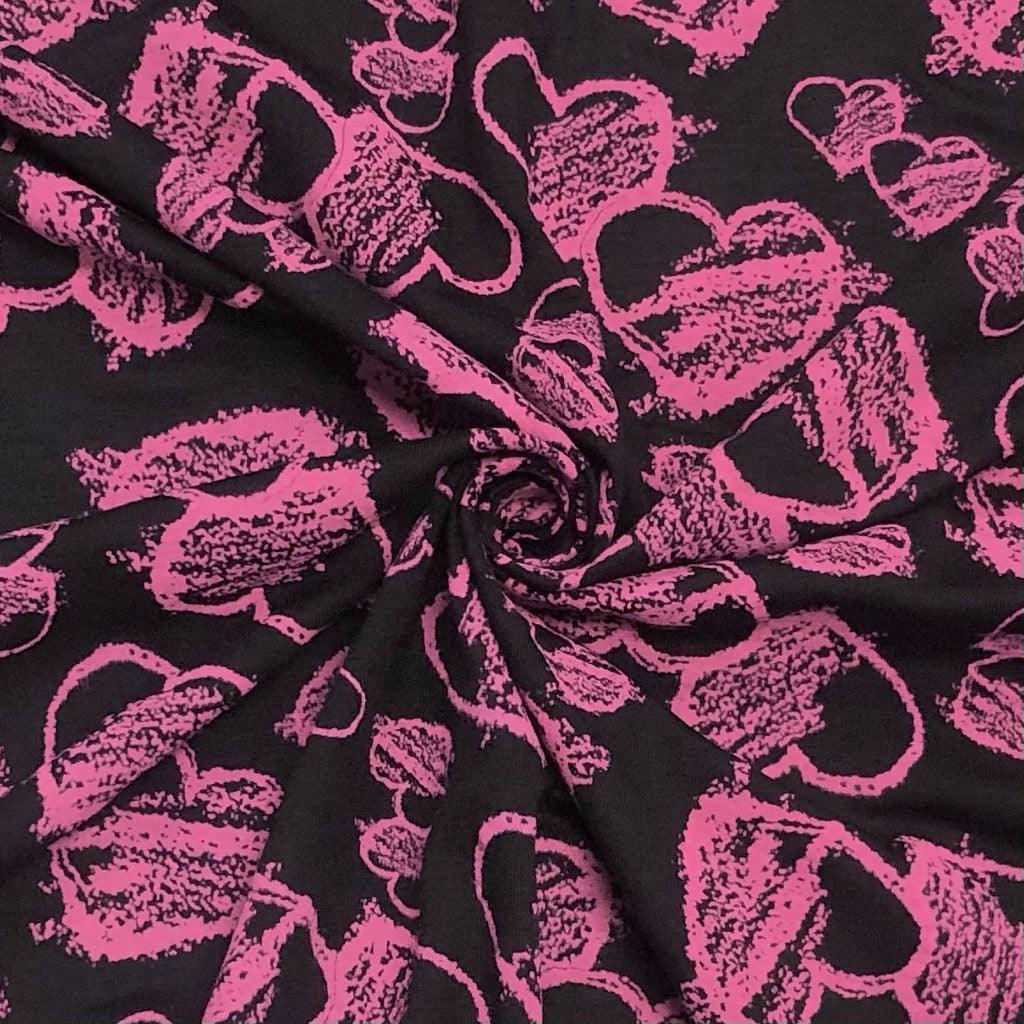 Pink Hearts on Black Knit Fabric - Pound Fabrics