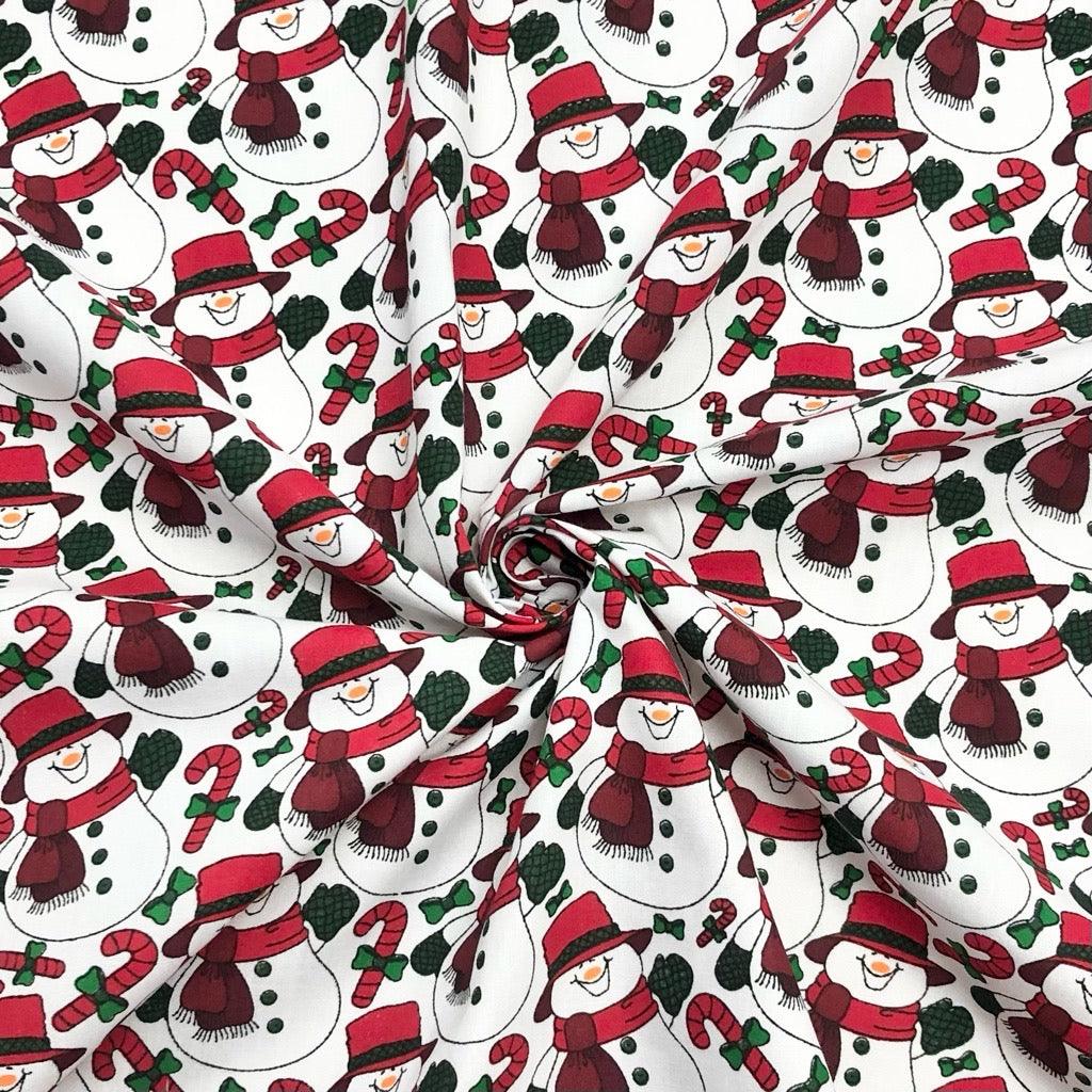 All Over Snowmen on White Polycotton Fabric - Pound Fabrics
