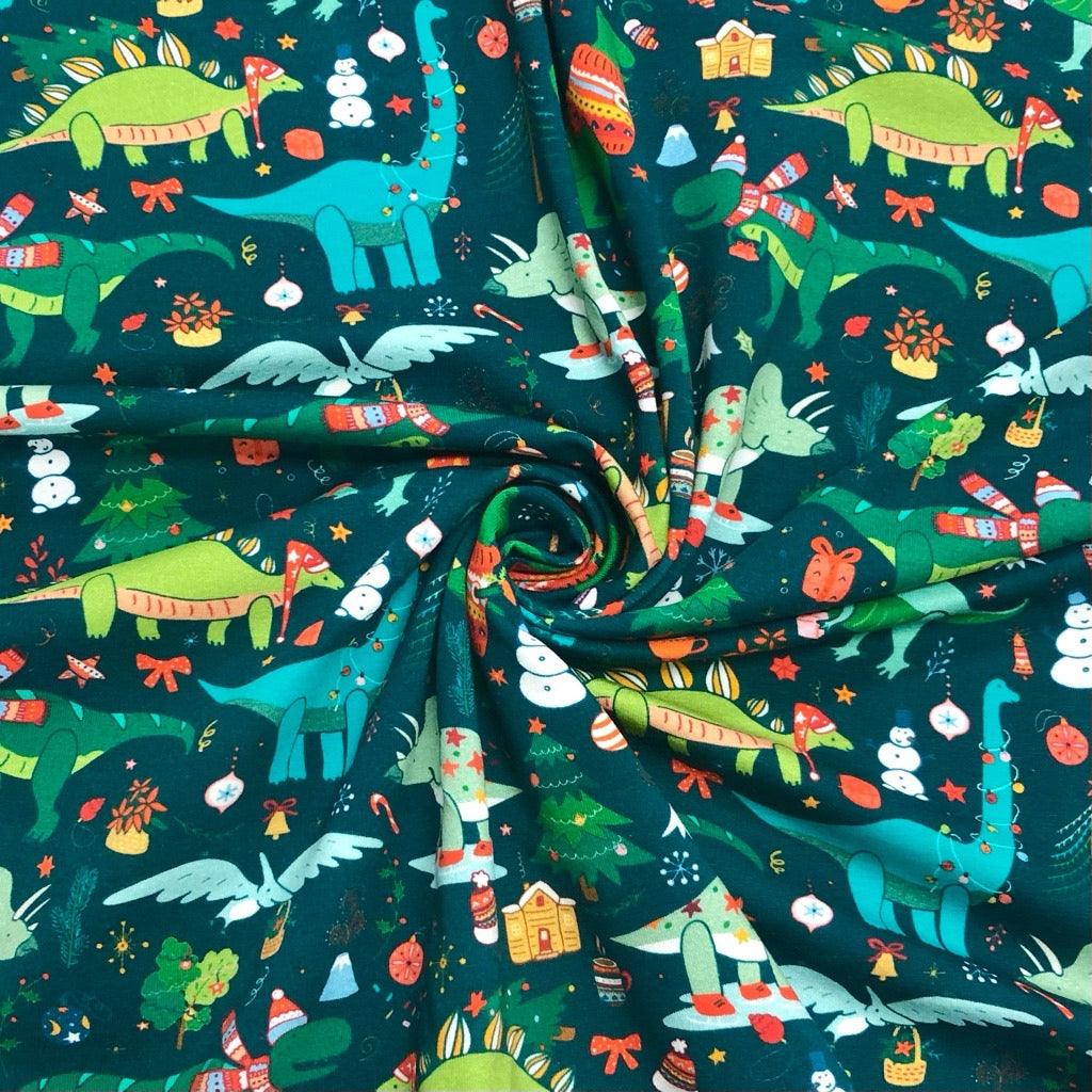 Christmas Dinosaurs on Dark Teal French Terry Fabric - Pound Fabrics