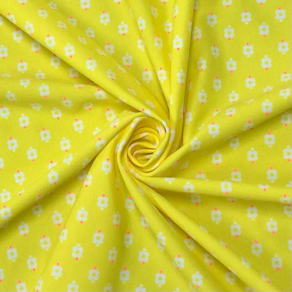 Mini White Flowers on Yellow Lycra Spandex Fabric