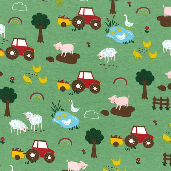 Animals and Tractors on Green Cotton Jersey Fabric - Pound Fabrics