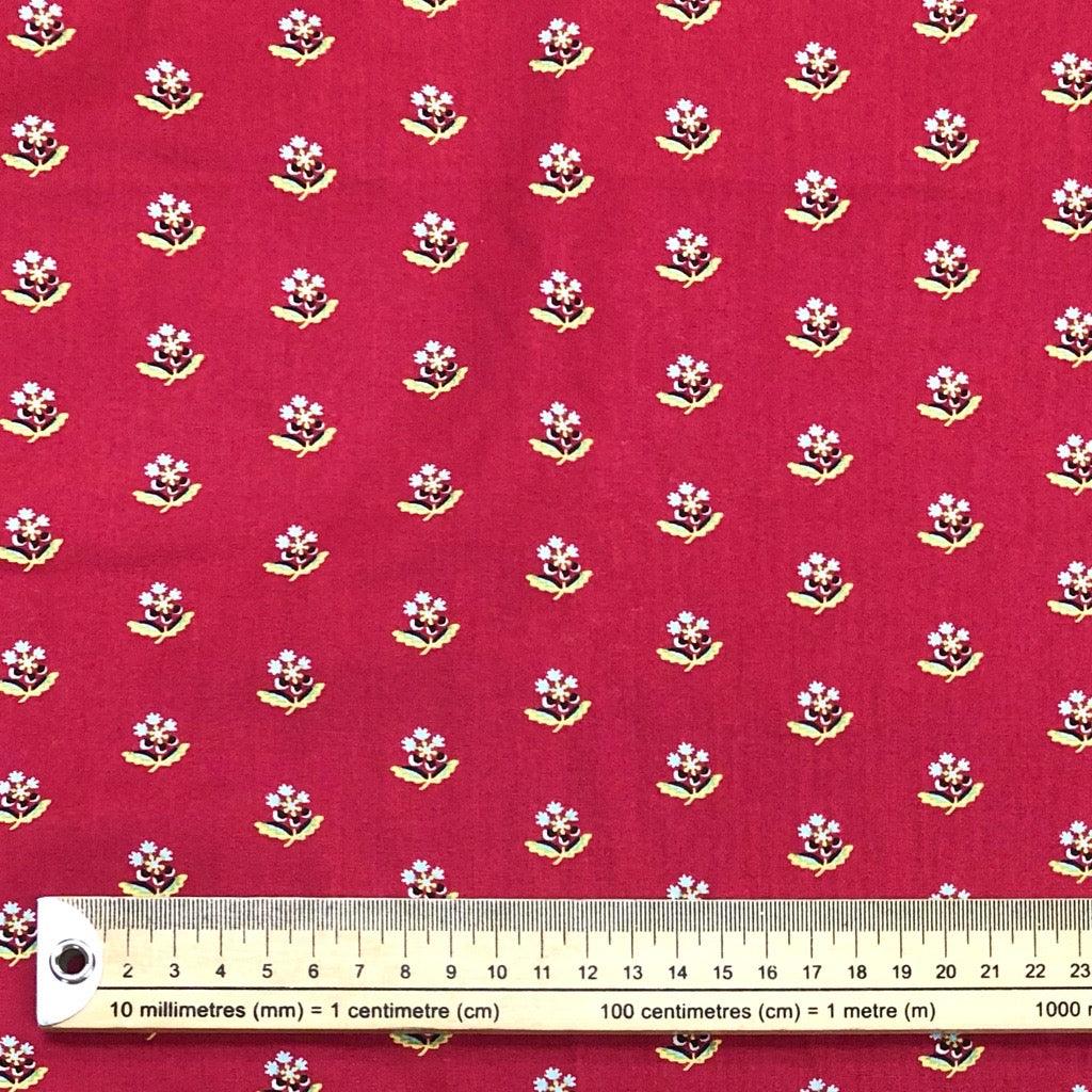 1 Metre Pre Cut - Blue and Yellow Single Flower on Red Cotton Poplin Fabric - Pound Fabrics