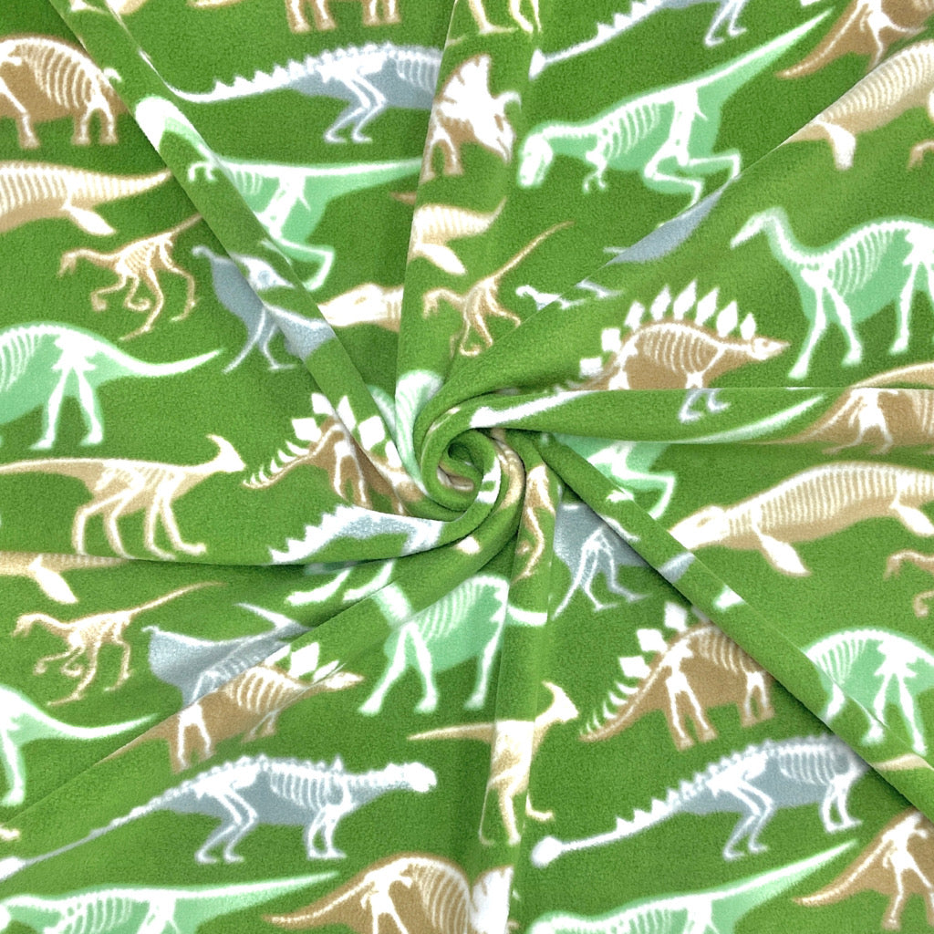 Dino Skeletons on Green Anti Pill Polar Fleece Fabric