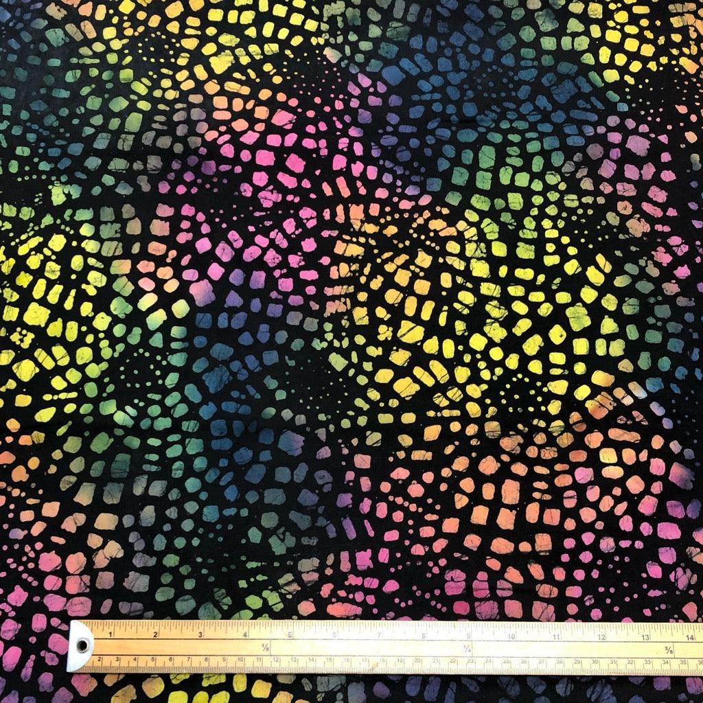 Rainbow Dots on Black Cotton Batik Fabric - John Louden - Pound Fabrics